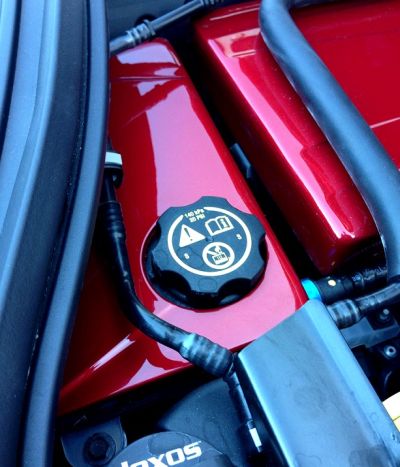 C7 Corvette painted surge tank cover in red 129