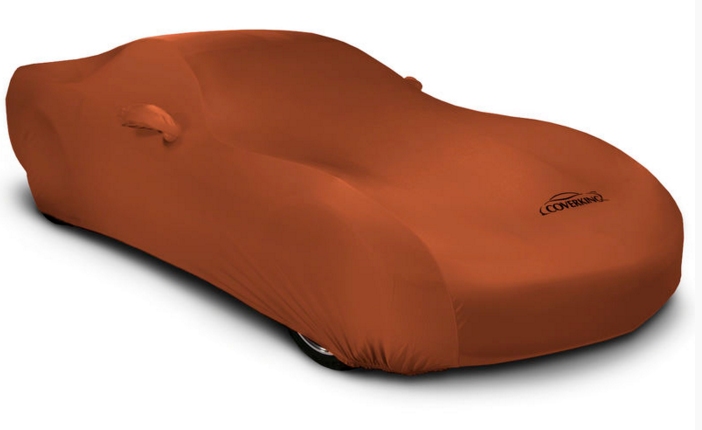 2008-2022 Dodge Challenger Coverking Satin Stretch Car Cover Inferno Orange  Coupon Code SS2007 will save you 10% this week only!   Protect your Challenger with this super soft form-fitting satin stretch car cover from Coverking. This indoor use car cover is the perfect way to keep your car dust free while it is in storage.   Coverking's 2008-2022 Dodge Challenger Inferno Orange Satin Stretch indoor car cover provides superior protection for your Dodge Challenger from dirt, dust, nicks, bumps, and scratches. Made with an elastic synthetic fabric, the cover stretches in all directions and molds to the contours of your Dodge Challenger to highlight its design. The cover includes a unique fleece lining allowing for a soft enclosure all around.   Each cover is made with your specific Dodge Challenger in mind including mirror and antenna pockets to create a complete custom fit. This cover is meant for indoor use only and is not intended for outdoor exposure.   Coverking's Satin Stretch Features: *Indoor use only *Matching mirror and antenna pockets included *Made of form-fitting lycra fabric *Elasticized edges keep dirt and dust out *Available in multiple colors *Made from soft synthetic fabric and a fleece lining for double protection *Three-piece construction using blind stitching to hide all seams *Custom-fit to mold to the exact specifications of your vehicle *No straps or tie-downs needed to secure the cover   Coverking designs its own fabrics and works with the world’s leading textile mills to handle manufacturing. With quality assurance teams dedicated to checking every batch of fabric, Coverking ensures that the material used in their products meet the most stringent assessments. Coverking checks to see if their material is breathable, allowing for the proper release of moisture. Coverking exposed their fabrics to intense UV rays to make sure their fabrics do not fade over time. Coverking goes through a series of stress test to make sure the materials hold up for everyday conditions. Above all, the covers are checked before reaching our customer to ensure quality.   Coverking covers are designed using as few seams as possible. Coverking believes that extra seams only increase the chance of leakage and failure. By eliminating seams, our covers have the best fit all around without compromising quality. Coverking custom car covers are specially designed and constructed using the latest double needle sewing techniques to ensure fine craftsmanship. The construction of fabric uses a technique to overlap seems in order to maintain durability, and avoid leakage. All covers have a backup stitch sewn in for extra support. All outdoor custom car covers are sewn with heavy, wax coated thread to ensure water resistance.   Fitment: 2008, 2009, 2010, 2011, 2012, 2013, 2014, 2015, 2016, 2017, 2018, 2019, 2020, 2021, 2022 Dodge Challenger   2008-2018 Dodge Challenger Coverking Satin Stretch Car Cover Inferno Orange